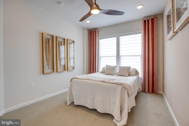 bedroom with recessed lighting, a ceiling fan, baseboards, and light carpet