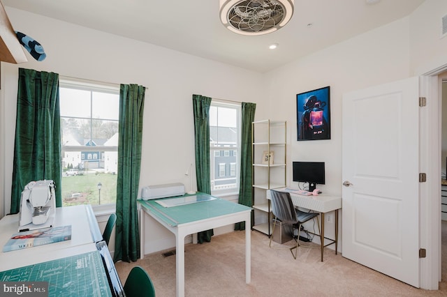 office space featuring light colored carpet, baseboards, visible vents, and recessed lighting