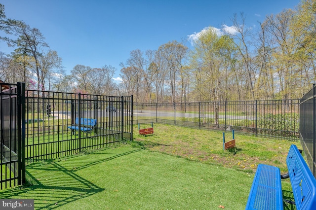 view of yard featuring fence