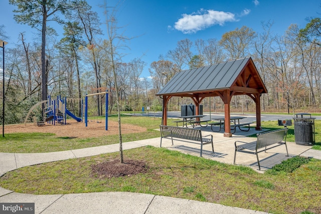 view of home's community featuring a gazebo, playground community, and a yard