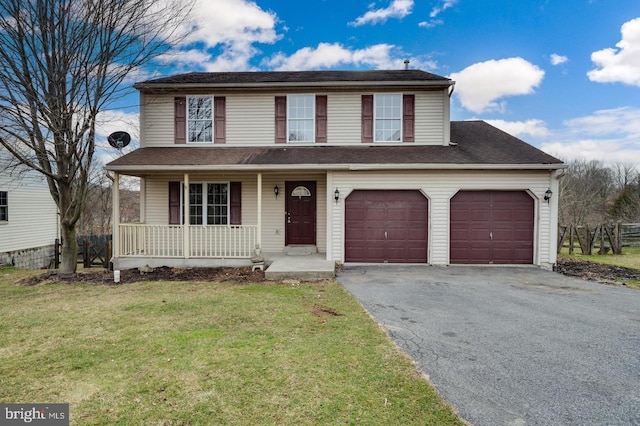 traditional-style house featuring a front yard, a porch, an attached garage, aphalt driveway, and roof with shingles