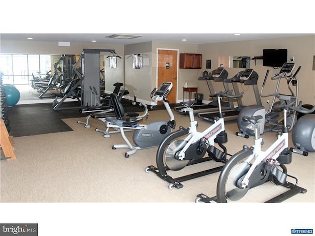 gym with recessed lighting and carpet floors