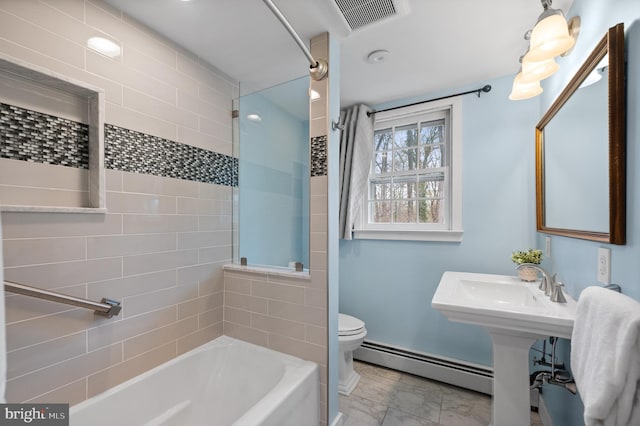 bathroom featuring toilet, marble finish floor, visible vents, and baseboard heating