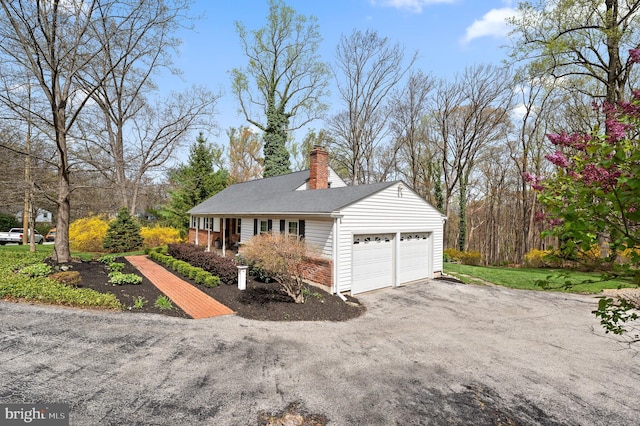 garage featuring driveway