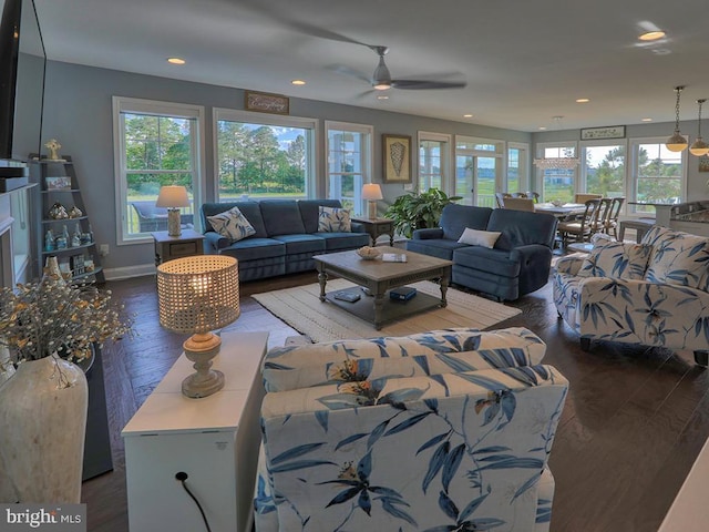 169 E Buckingham Dr, Rehoboth Beach, DE 19971 - living area featuring wood finished floors, ceiling fan, recessed lighting, and baseboards