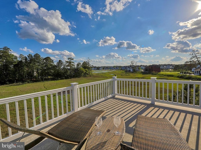 169 E Buckingham Dr, Rehoboth Beach, DE 19971 - deck featuring a lawn