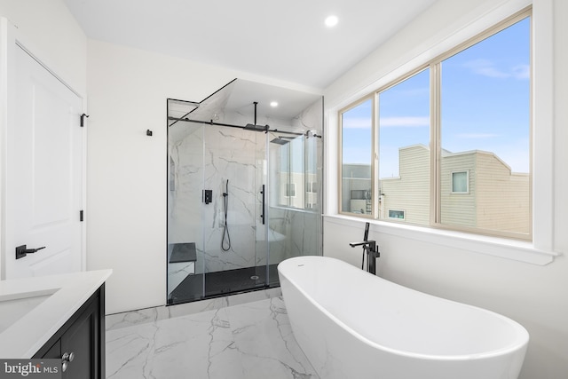 2340 Alter St, Philadelphia, PA 19146 - bathroom featuring a freestanding tub, recessed lighting, vanity, a marble finish shower, and marble finish floor
