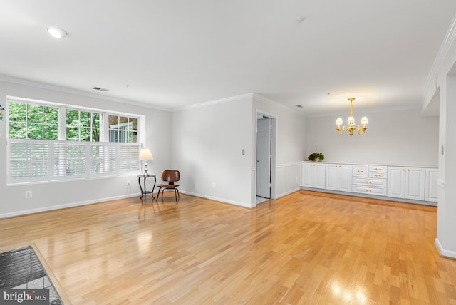 12310 Rosslare Ridge Rd Unit 301, Lutherville Timonium, MD 21093 - unfurnished room with a chandelier, light wood finished floors, crown molding, and baseboards
