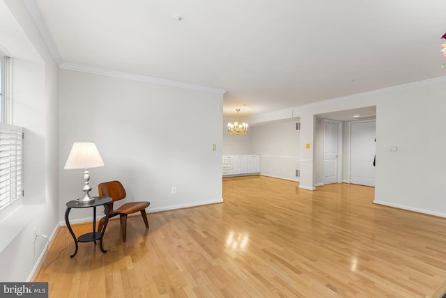 12310 Rosslare Ridge Rd Unit 301, Lutherville Timonium, MD 21093 - unfurnished room featuring a chandelier, crown molding, light wood-style floors, and baseboards