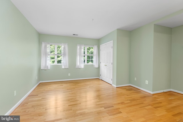 12310 Rosslare Ridge Rd Unit 301, Lutherville Timonium, MD 21093 - unfurnished room featuring light wood-style floors and baseboards