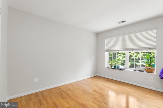 12310 Rosslare Ridge Rd Unit 301, Lutherville Timonium, MD 21093 - unfurnished room with light wood-style floors and baseboards