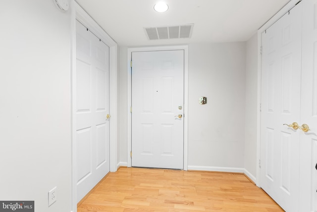 12310 Rosslare Ridge Rd Unit 301, Lutherville Timonium, MD 21093 - entryway featuring baseboards and light wood-type flooring