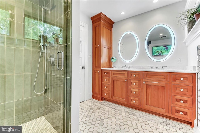 bathroom featuring a shower stall, recessed lighting, and double vanity