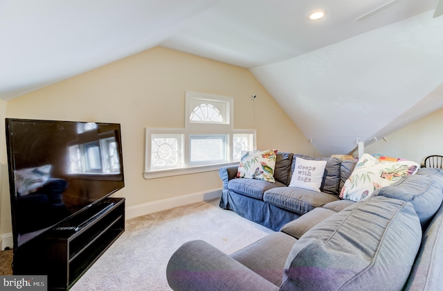 carpeted living room with vaulted ceiling, baseboards, and recessed lighting