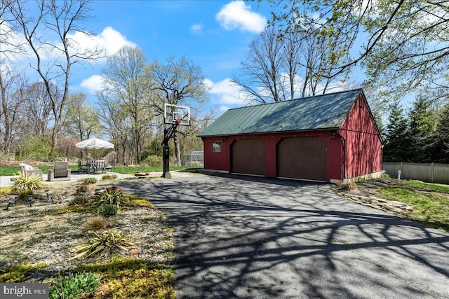 detached garage with fence