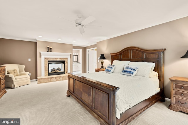 5117 Pheasant Ridge Rd, Fairfax, VA 22030 - bedroom with light colored carpet, a tiled fireplace, baseboards, ornamental molding, and ensuite bath