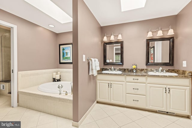 5117 Pheasant Ridge Rd, Fairfax, VA 22030 - full bathroom featuring double vanity, a bath, tile patterned flooring, a skylight, and ornamental molding