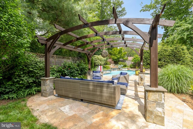 5117 Pheasant Ridge Rd, Fairfax, VA 22030 - fenced backyard featuring a pergola, an outdoor hangout area, and a patio