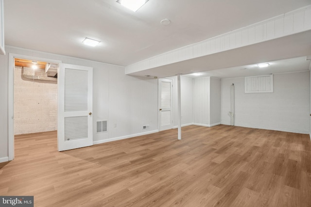 206 E Indian Spring Dr, Silver Spring, MD 20901 - finished below grade area featuring light wood-type flooring and baseboards