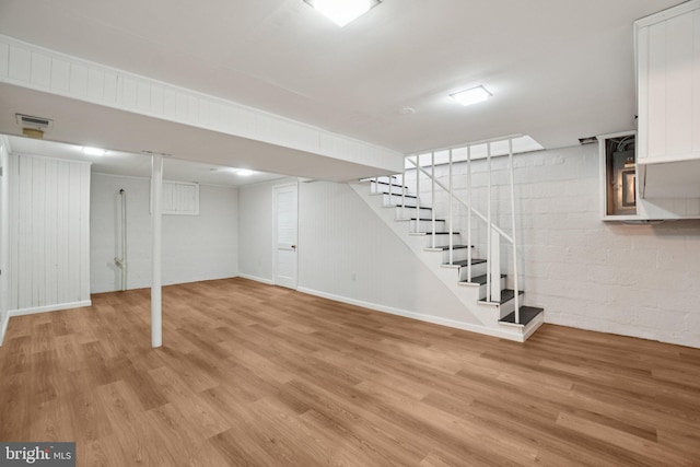 206 E Indian Spring Dr, Silver Spring, MD 20901 - finished basement featuring stairs, light wood finished floors, and baseboards