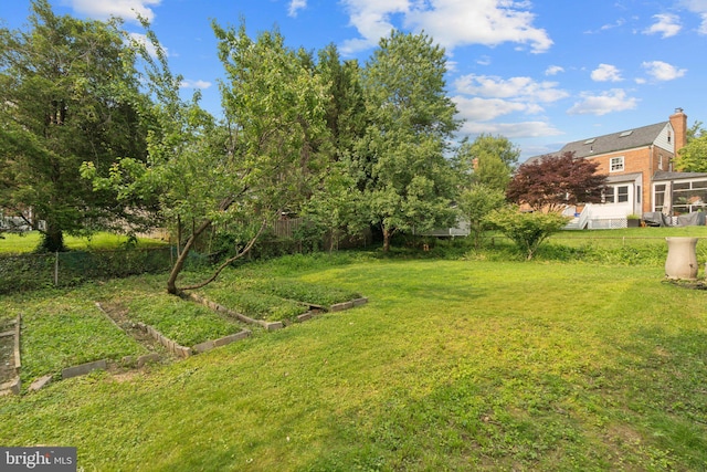 206 E Indian Spring Dr, Silver Spring, MD 20901 - view of yard featuring a vegetable garden
