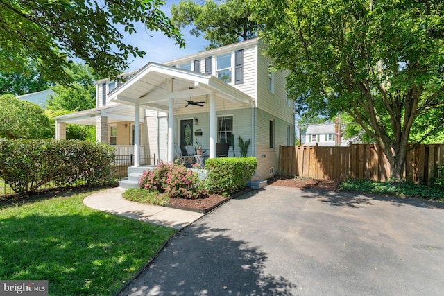 6002 Williamsburg Rd, Alexandria, VA 22303 - view of front of house with a ceiling fan, a porch, and brick siding