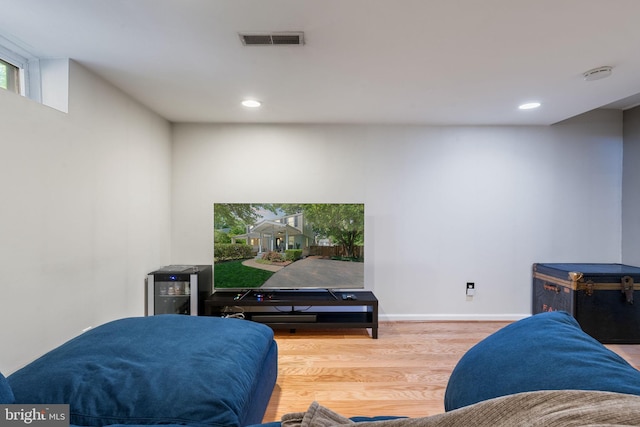 6002 Williamsburg Rd, Alexandria, VA 22303 - living room featuring wood finished floors, recessed lighting, and baseboards