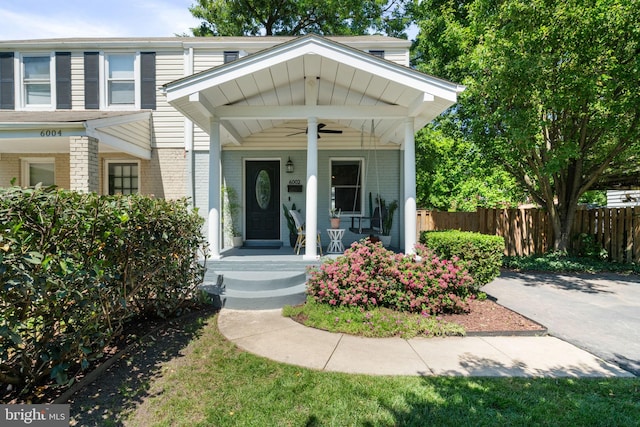 6002 Williamsburg Rd, Alexandria, VA 22303 - view of front of home with ceiling fan, a porch, and brick siding
