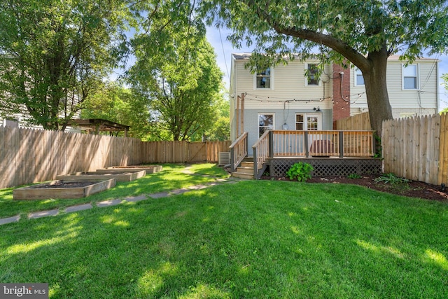 6002 Williamsburg Rd, Alexandria, VA 22303 - view of yard with a vegetable garden and a wooden deck