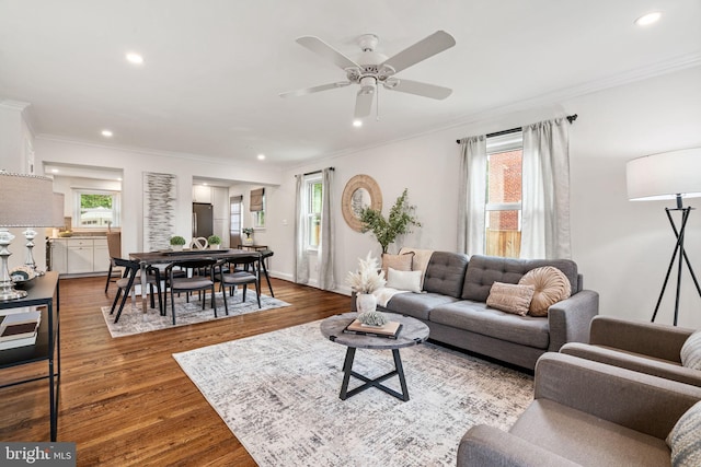 6005 Monticello Rd, Alexandria, VA 22303 - living area featuring healthy amount of natural light, ceiling fan, recessed lighting, wood finished floors, and ornamental molding