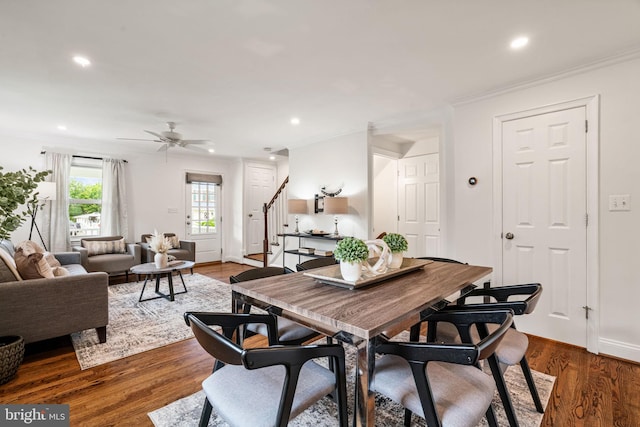 6005 Monticello Rd, Alexandria, VA 22303 - dining space with stairway, dark wood finished floors, recessed lighting, a ceiling fan, and ornamental molding