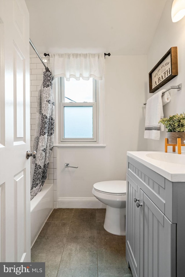6005 Monticello Rd, Alexandria, VA 22303 - bathroom featuring toilet, vanity, baseboards, and shower / tub combo with curtain