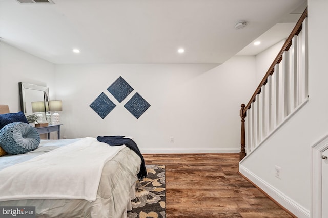 6005 Monticello Rd, Alexandria, VA 22303 - bedroom with wood finished floors, recessed lighting, and baseboards