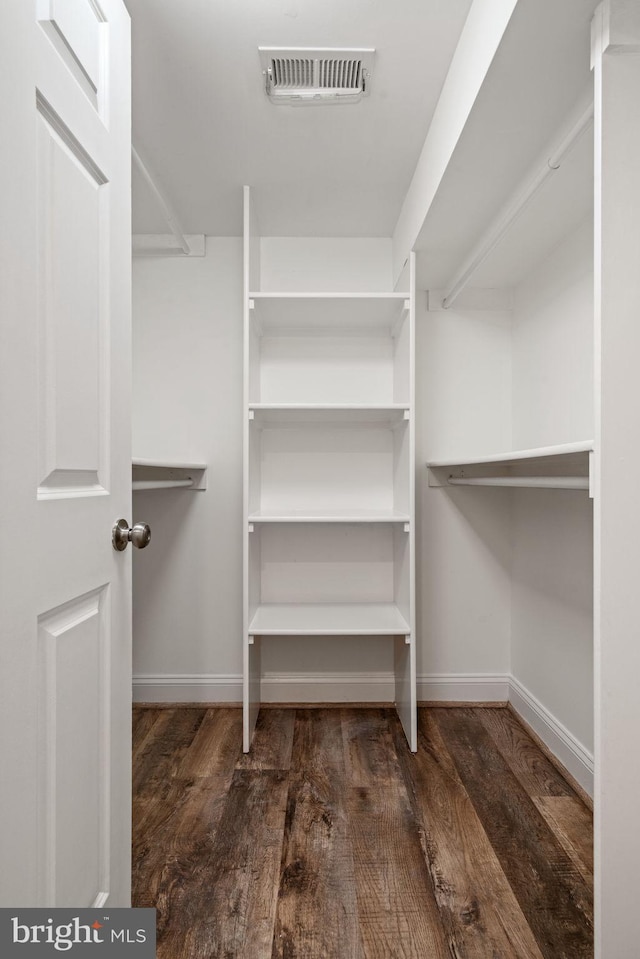 6005 Monticello Rd, Alexandria, VA 22303 - walk in closet with wood finished floors