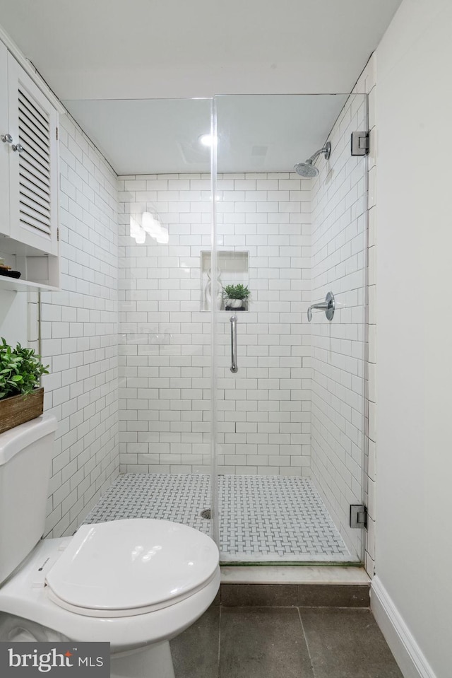 6005 Monticello Rd, Alexandria, VA 22303 - full bath featuring toilet, a stall shower, tile patterned flooring, and baseboards