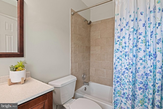 full bath featuring toilet, shower / bath combo, and vanity