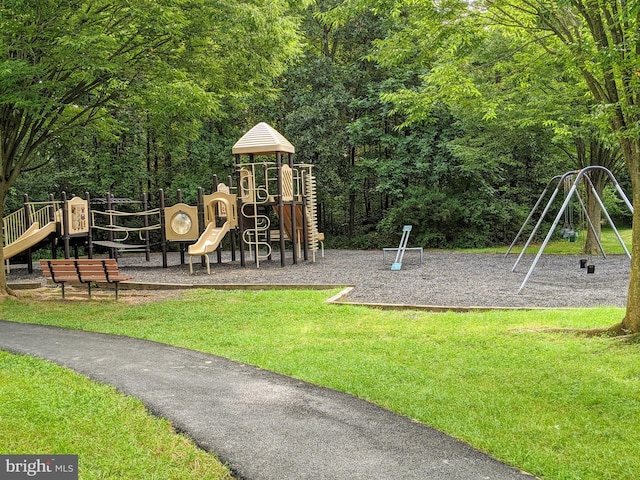 community playground featuring a yard