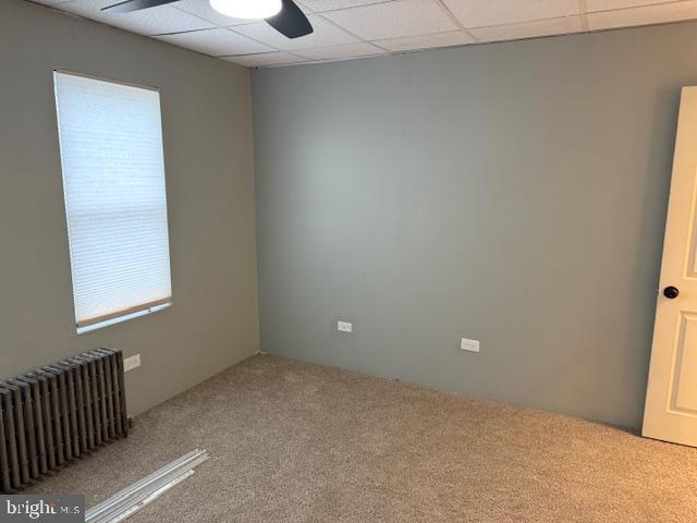1132 Church St, Lebanon, PA 17046 - carpeted spare room with a paneled ceiling and radiator