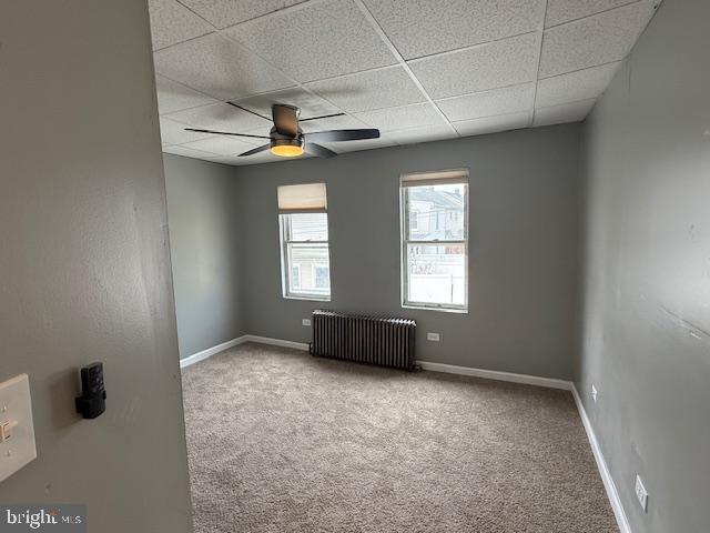 1132 Church St, Lebanon, PA 17046 - unfurnished room with a paneled ceiling, carpet flooring, and radiator