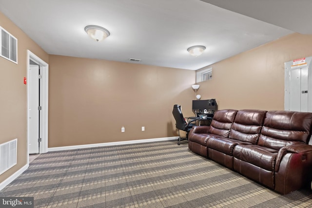 living area featuring carpet, visible vents, and baseboards