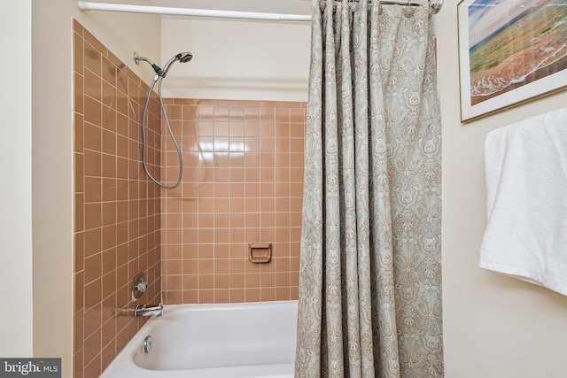full bathroom featuring shower / bathtub combination with curtain