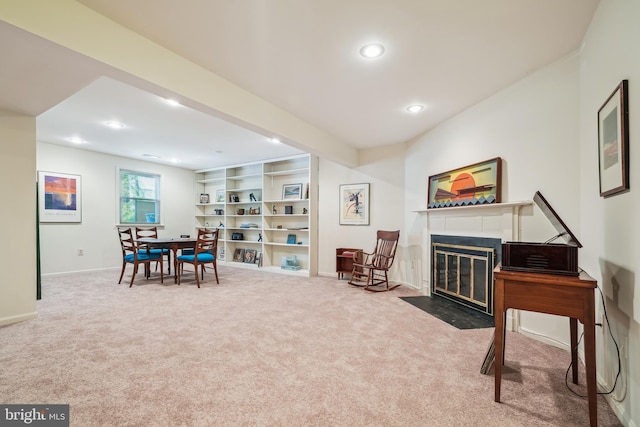 game room with baseboards, recessed lighting, carpet flooring, and a fireplace with flush hearth