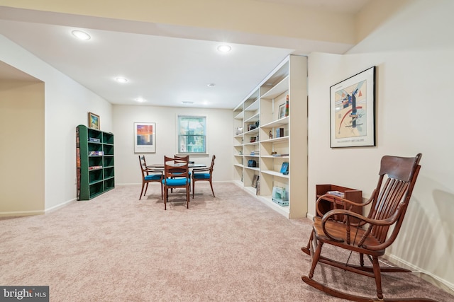 interior space with carpet, baseboards, and recessed lighting