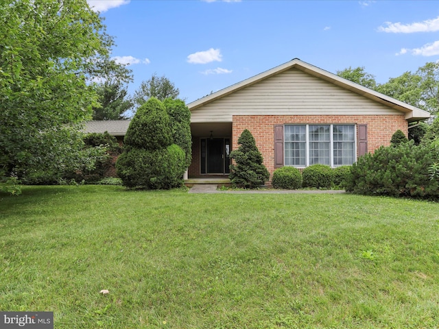 11490 Blue Mountain Dr, Waynesboro, PA 17268 - view of front of house with brick siding and a front lawn