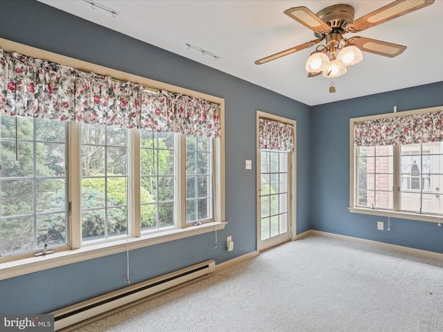 11490 Blue Mountain Dr, Waynesboro, PA 17268 - spare room featuring a baseboard heating unit, healthy amount of natural light, carpet, and a ceiling fan