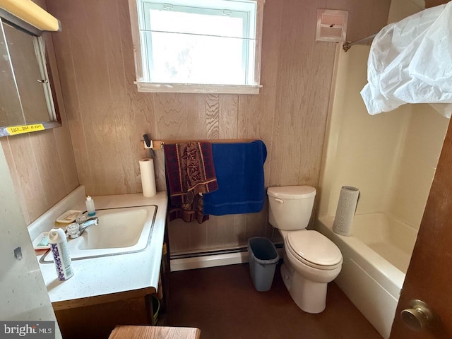 full bath featuring toilet, a baseboard radiator, wood walls, and vanity