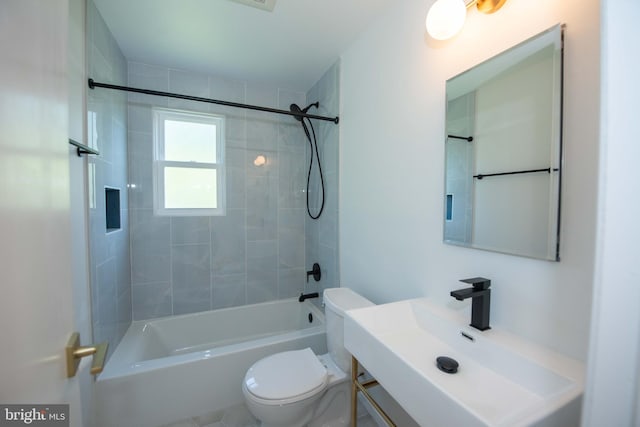 full bath featuring vanity, toilet, and tub / shower combination