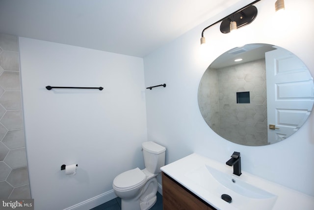 full bath with toilet and vanity