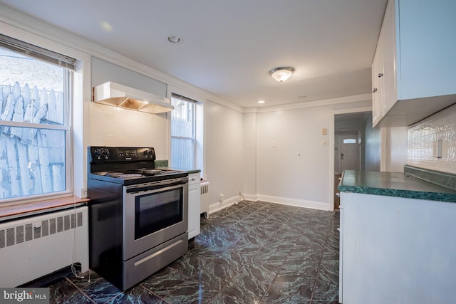 kitchen featuring radiator, stainless steel range with electric cooktop, under cabinet range hood, white cabinets, and dark countertops