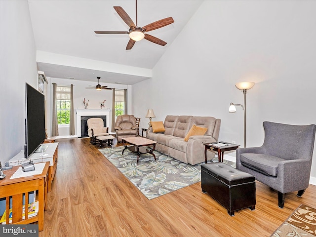 6538 Autumn Olive Dr, Frederick, MD 21703 - living area featuring high vaulted ceiling, a ceiling fan, and wood finished floors